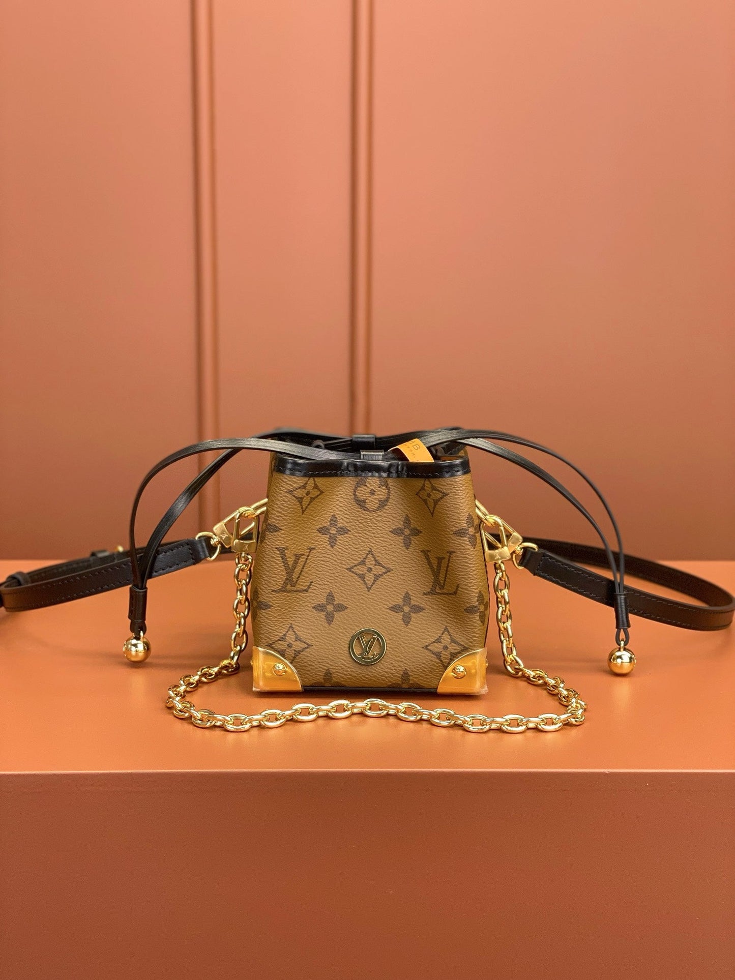 Noé Geldbörse LV Charms Monogramm Rückseite