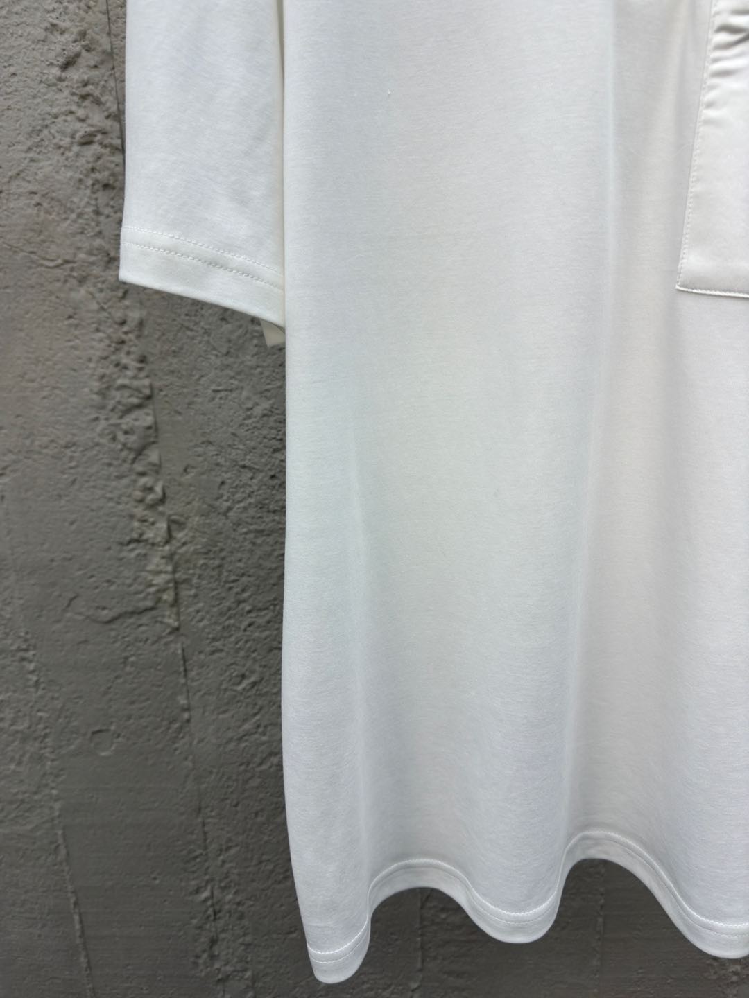 Polo à poche zippée