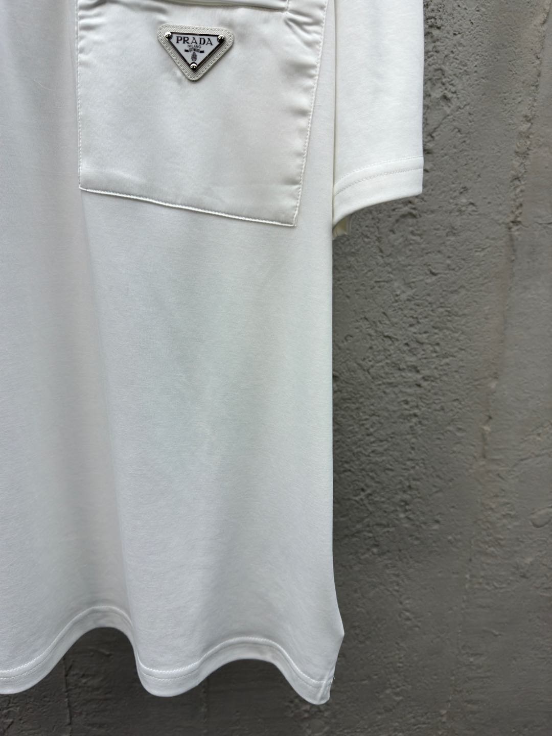 Polo à poche zippée