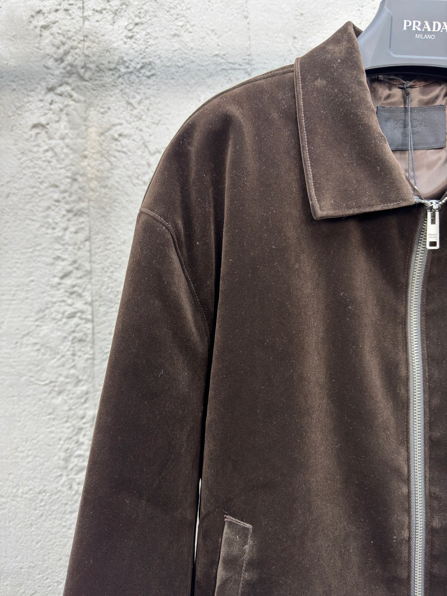 Veste en velours avec étiquette triangulaire