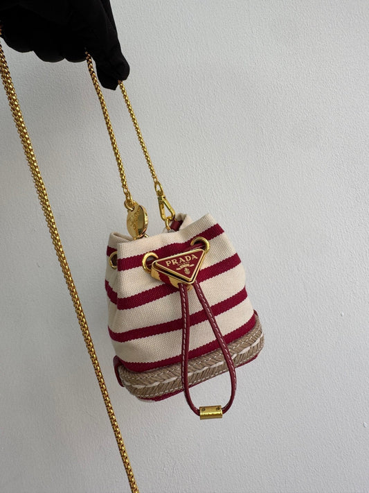 Mini sac seau en toile rayée avec détails dorés