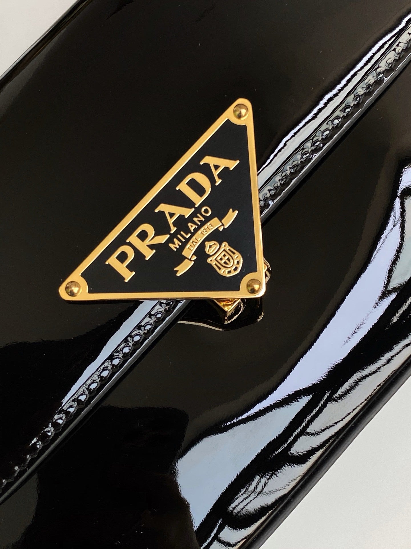 Black Patent Leather Baguette Bag with Gold Accents