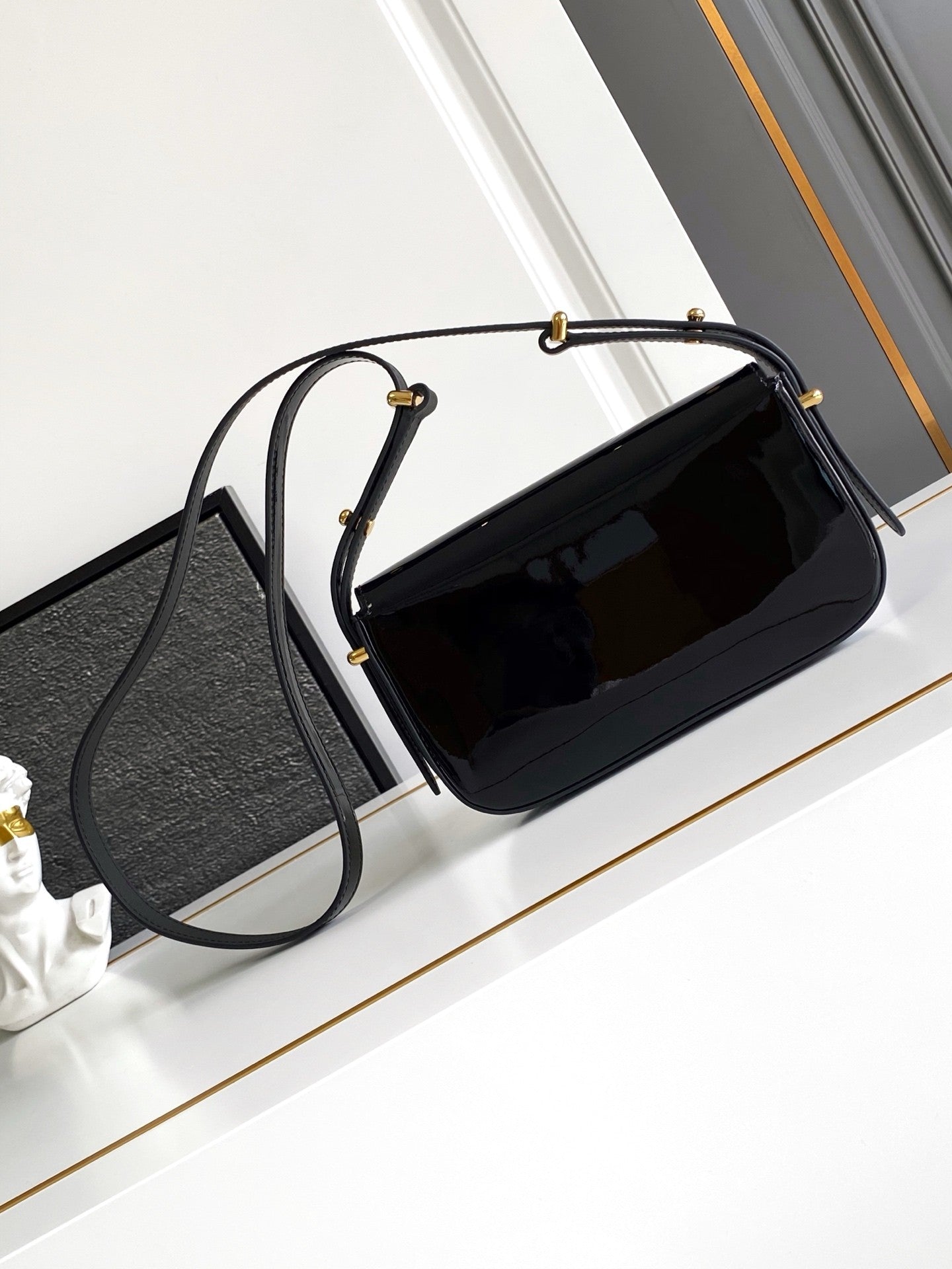 Black Patent Leather Baguette Bag with Gold Accents