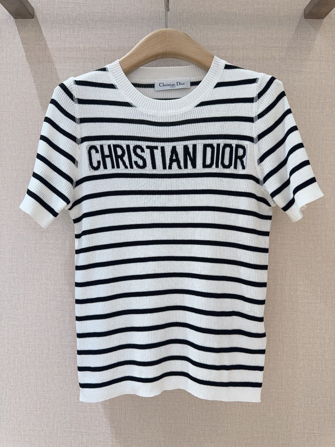 Monochrome Stripe Knit Top with Bold Text Embellishment