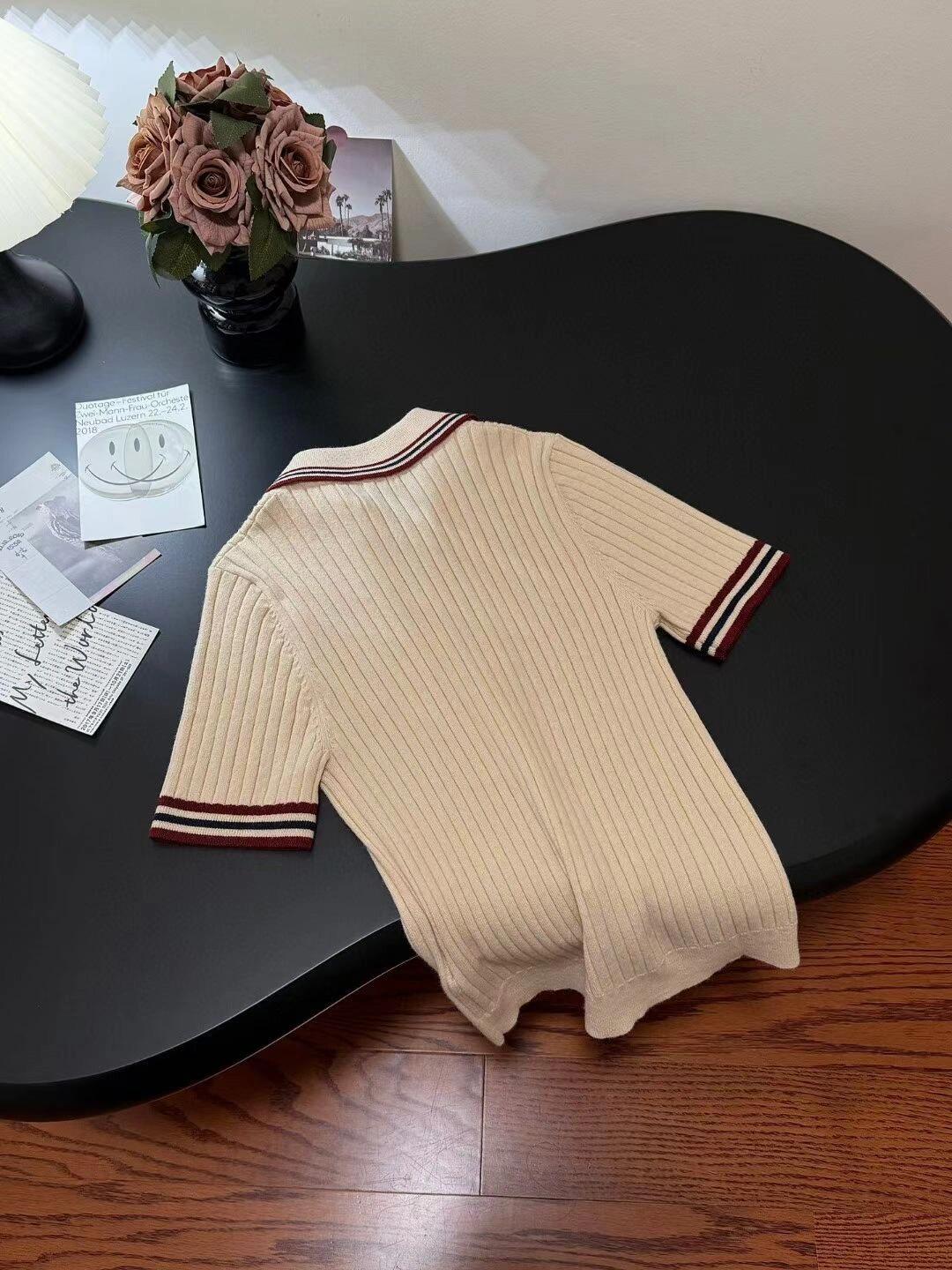 Col polo tricoté color block à manches courtes