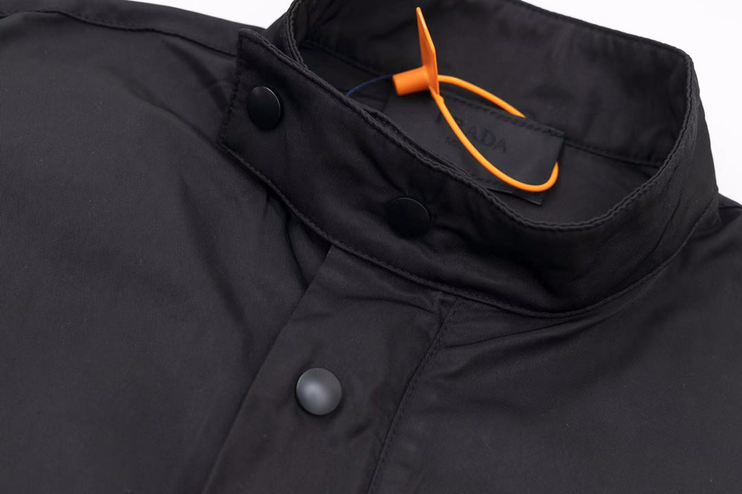 veste légère à logo triangulaire