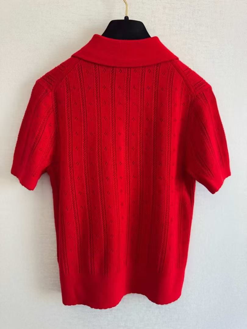 Polo en laine à manches courtes en maille ajourée verticale