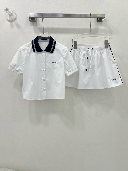 Costume tricoté bleu marine contrasté printemps/été 25