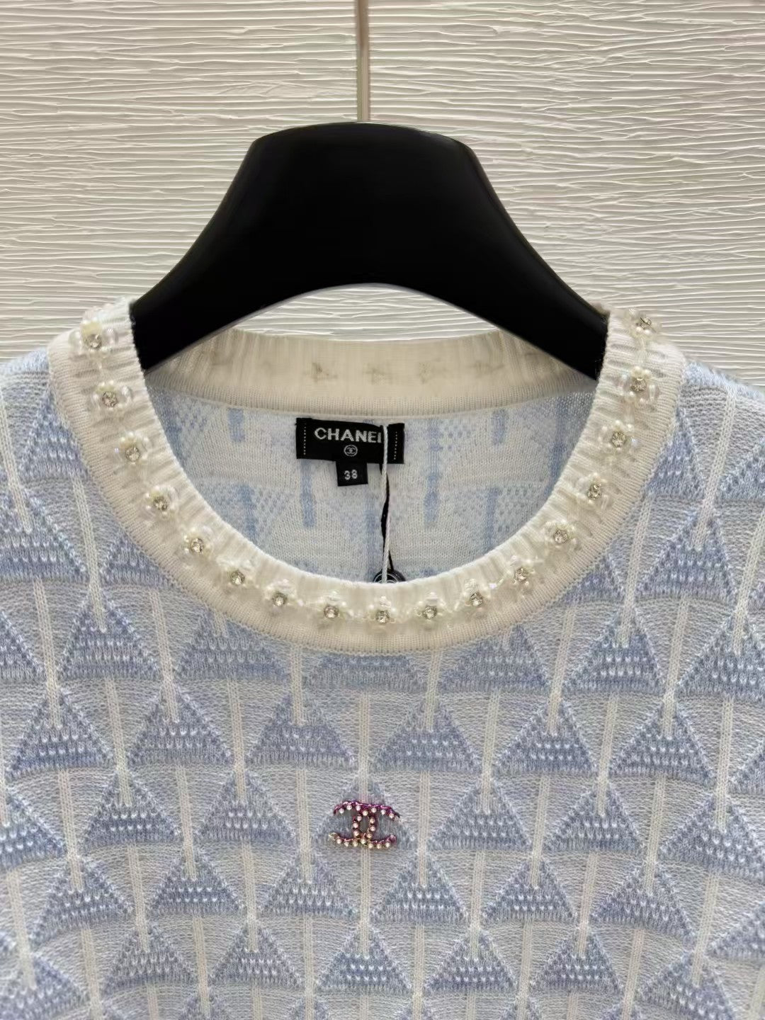 Col ras du cou, manches courtes en tricot perlé