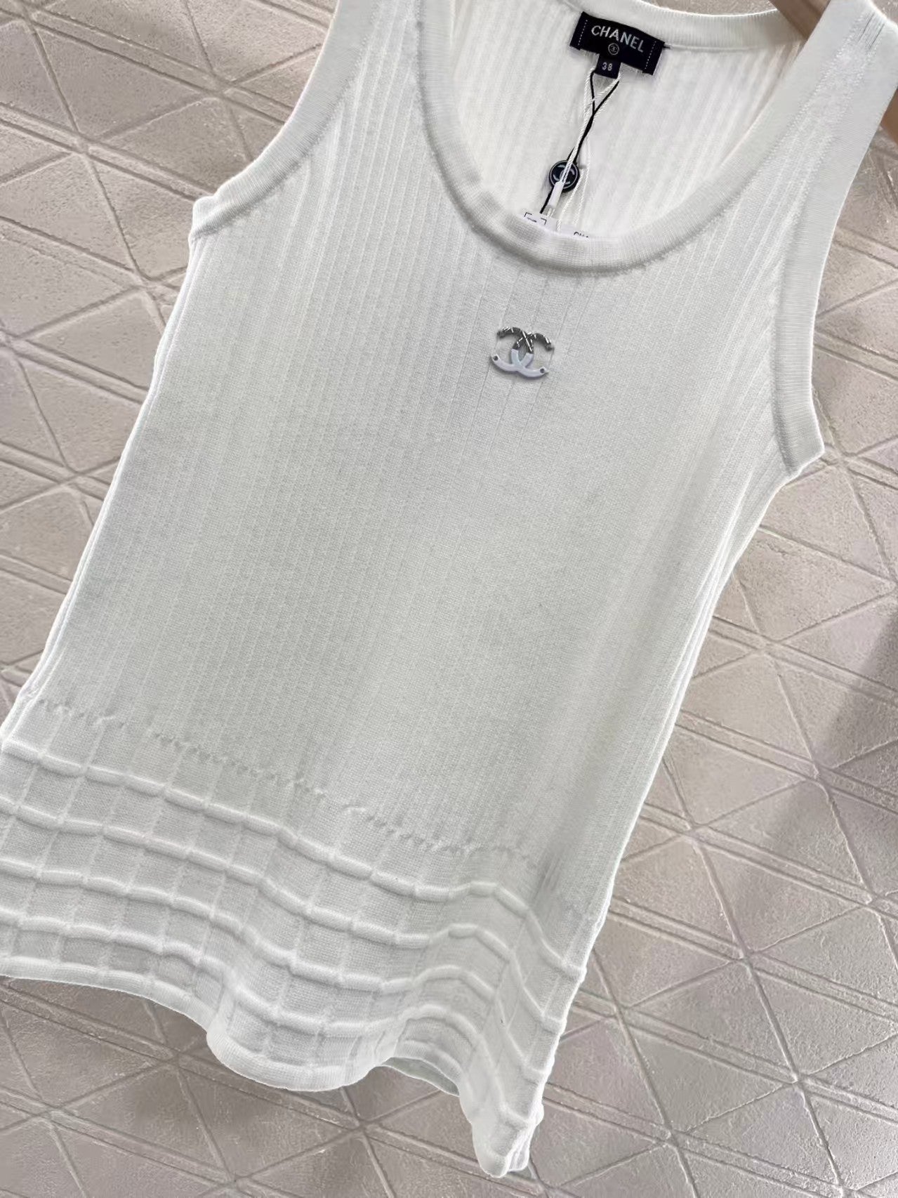 Gilet tricoté à motif 3D