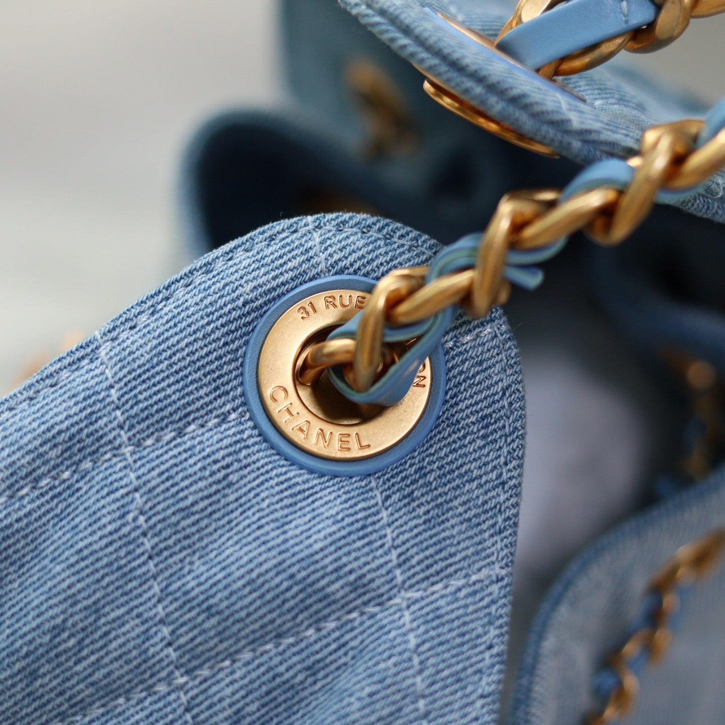 Denim Quilted Bucket Bag with Contrast Chain