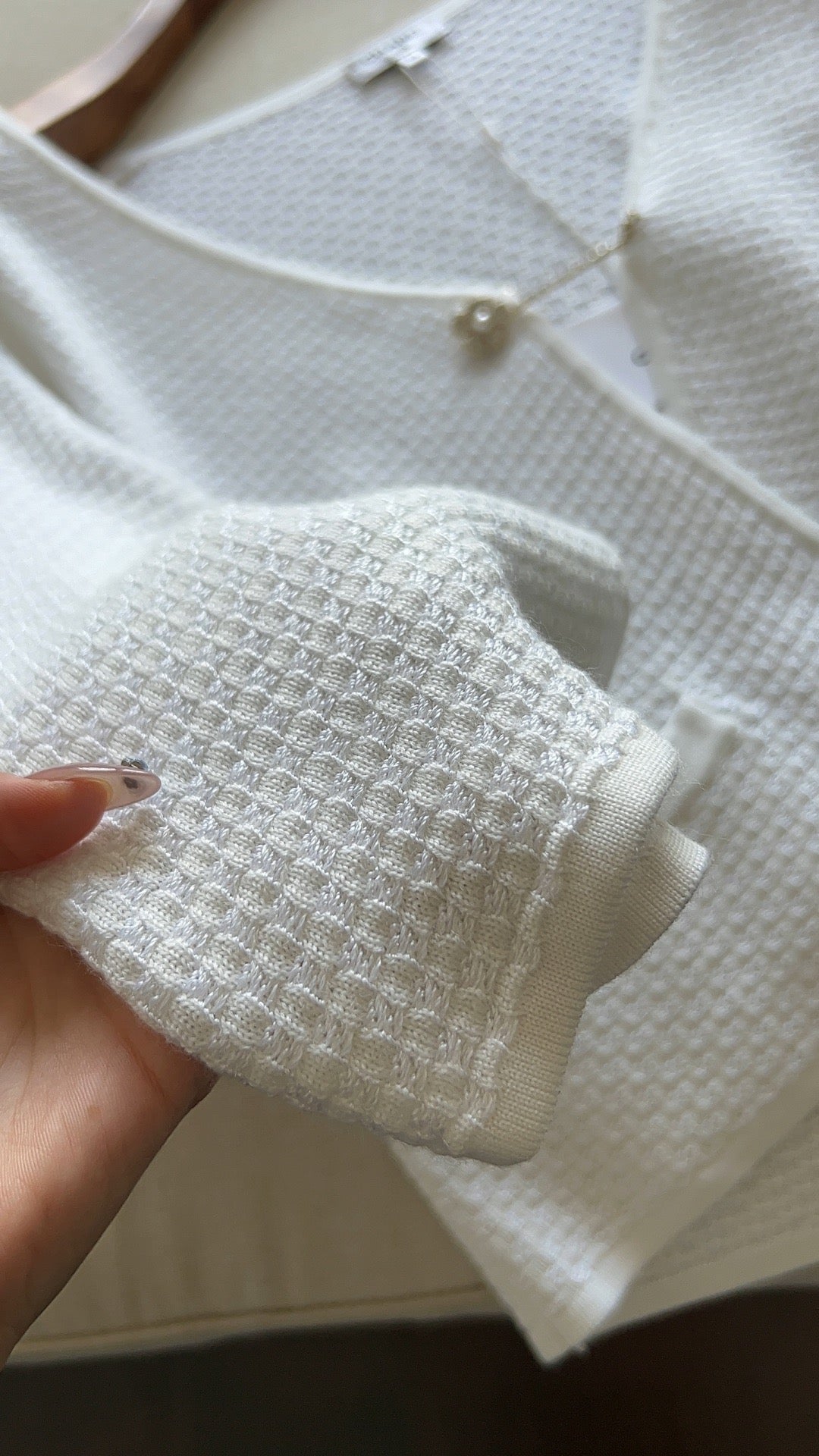 Camellia – Strickjacke mit Rautenknöpfen