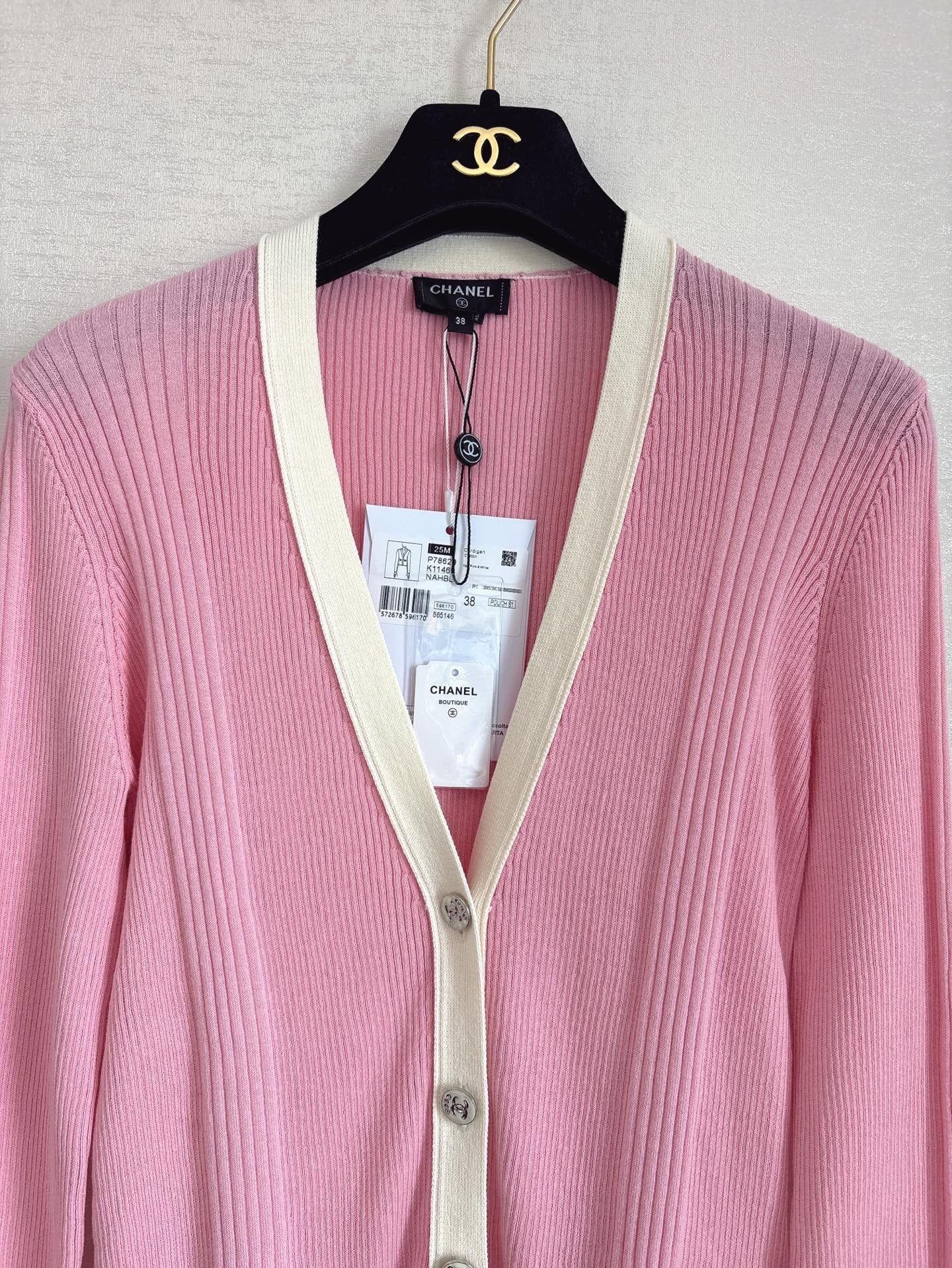Cardigan rose de la collection Plage