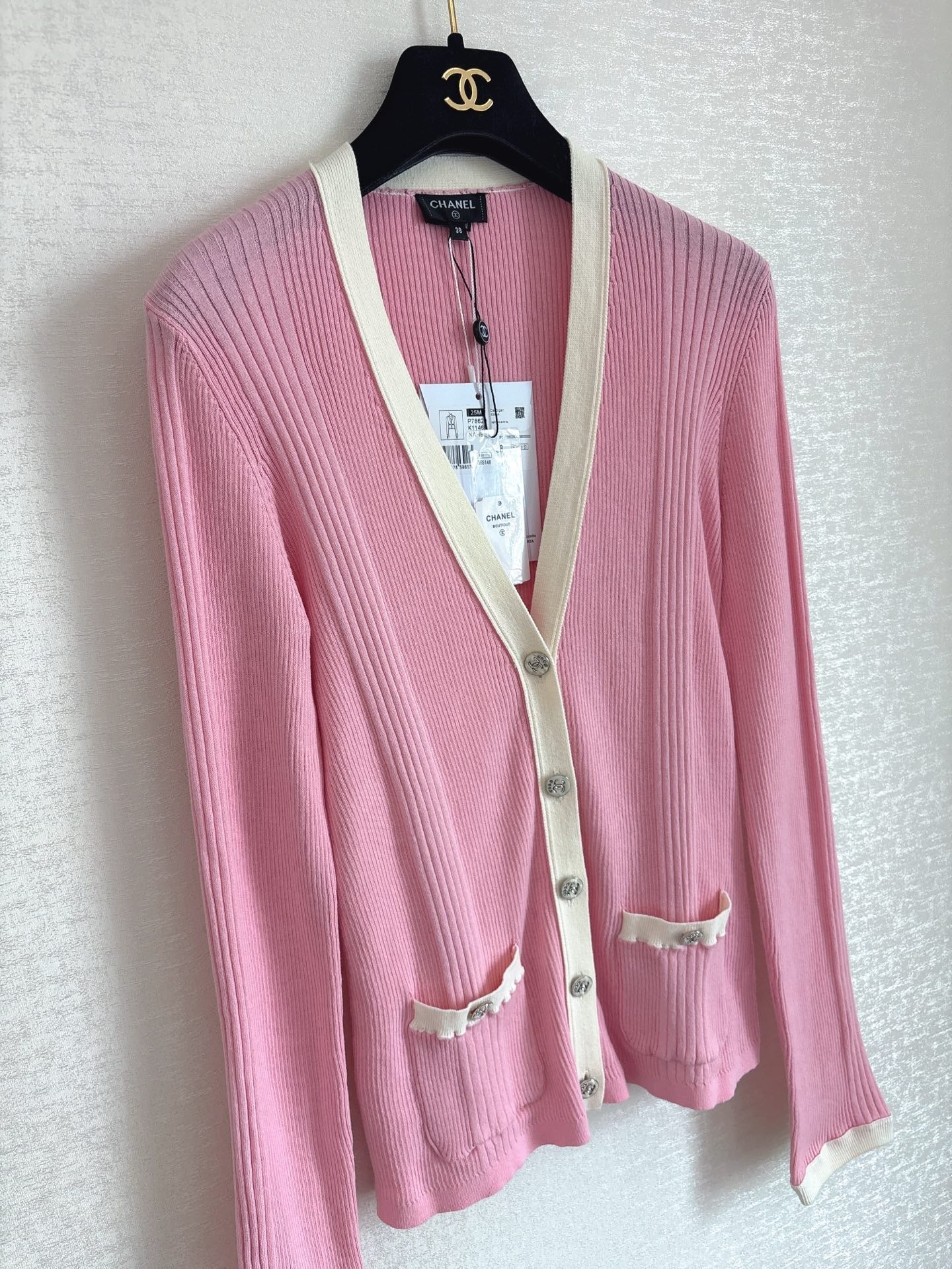 Cardigan rose de la collection Plage