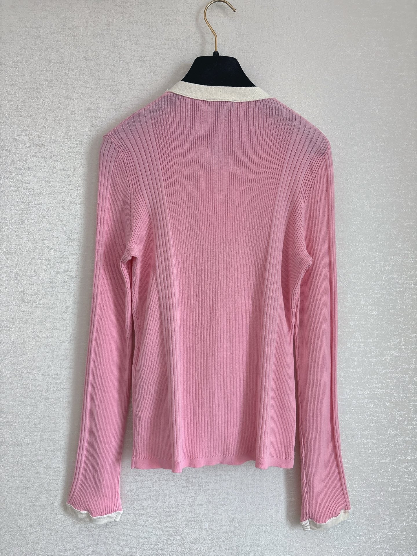 Cardigan rose de la collection Plage