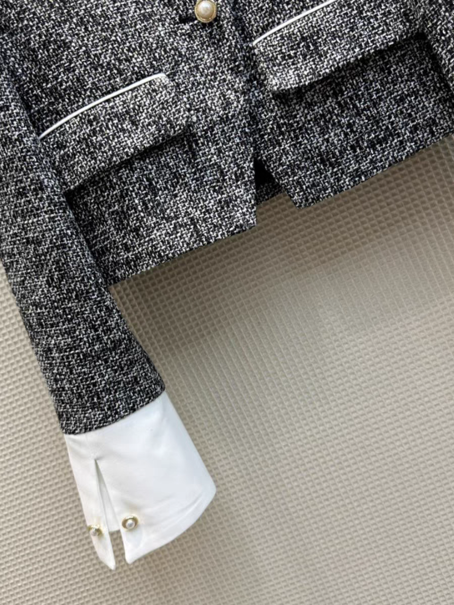 Veste courte à col montant de couleur contrastante à la mode