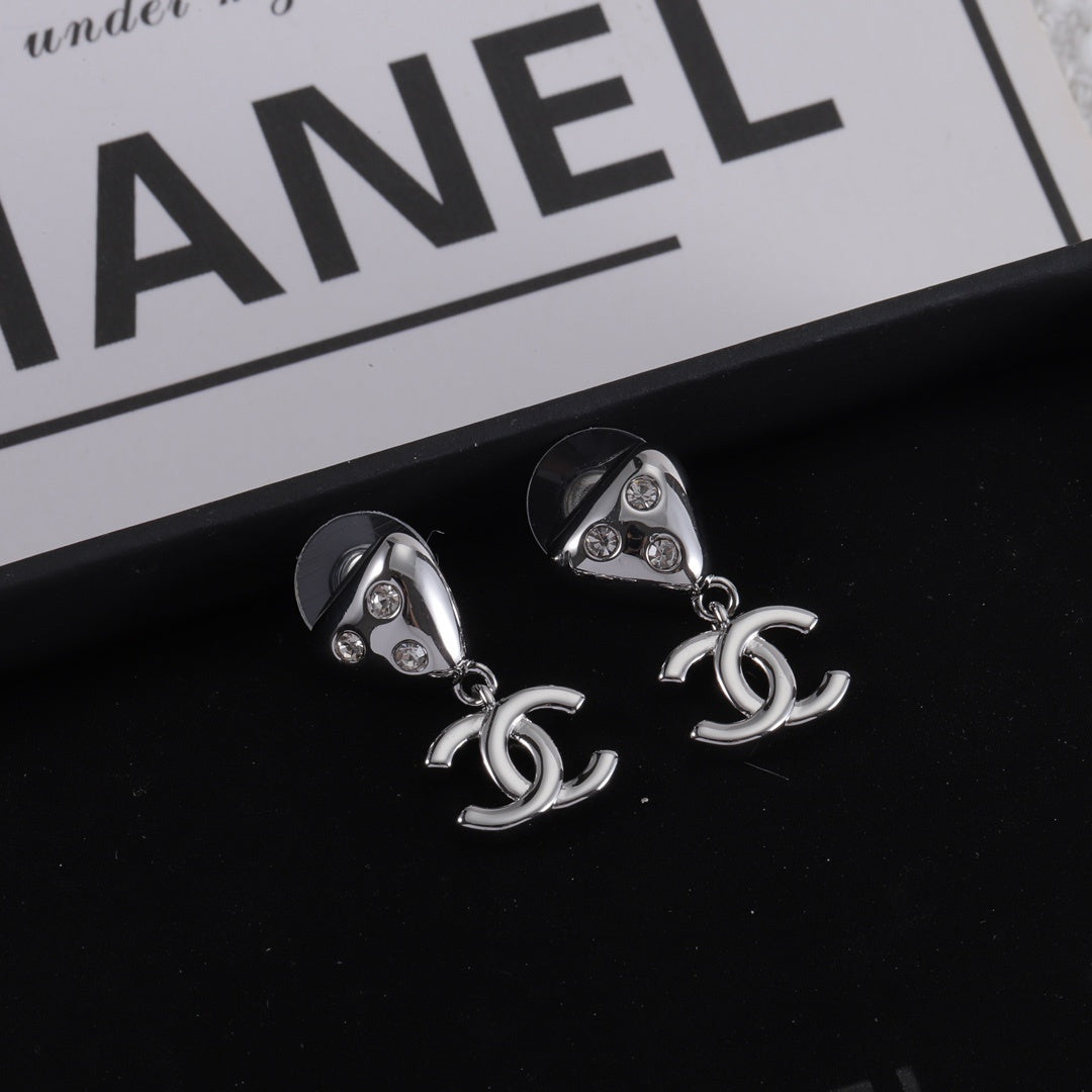 Neue dreieckige Diamant-Goldohrringe