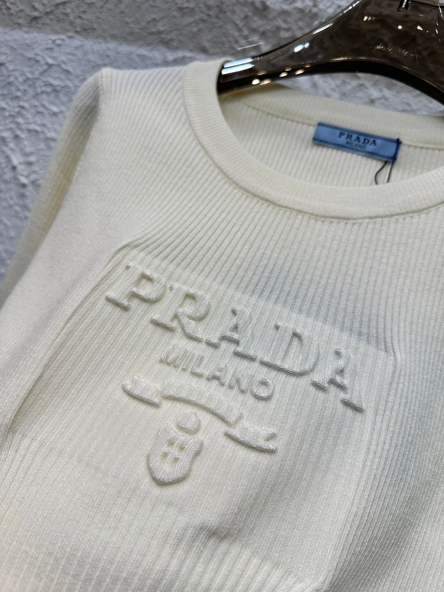 Manches longues tricotées imprimées en acier 3D