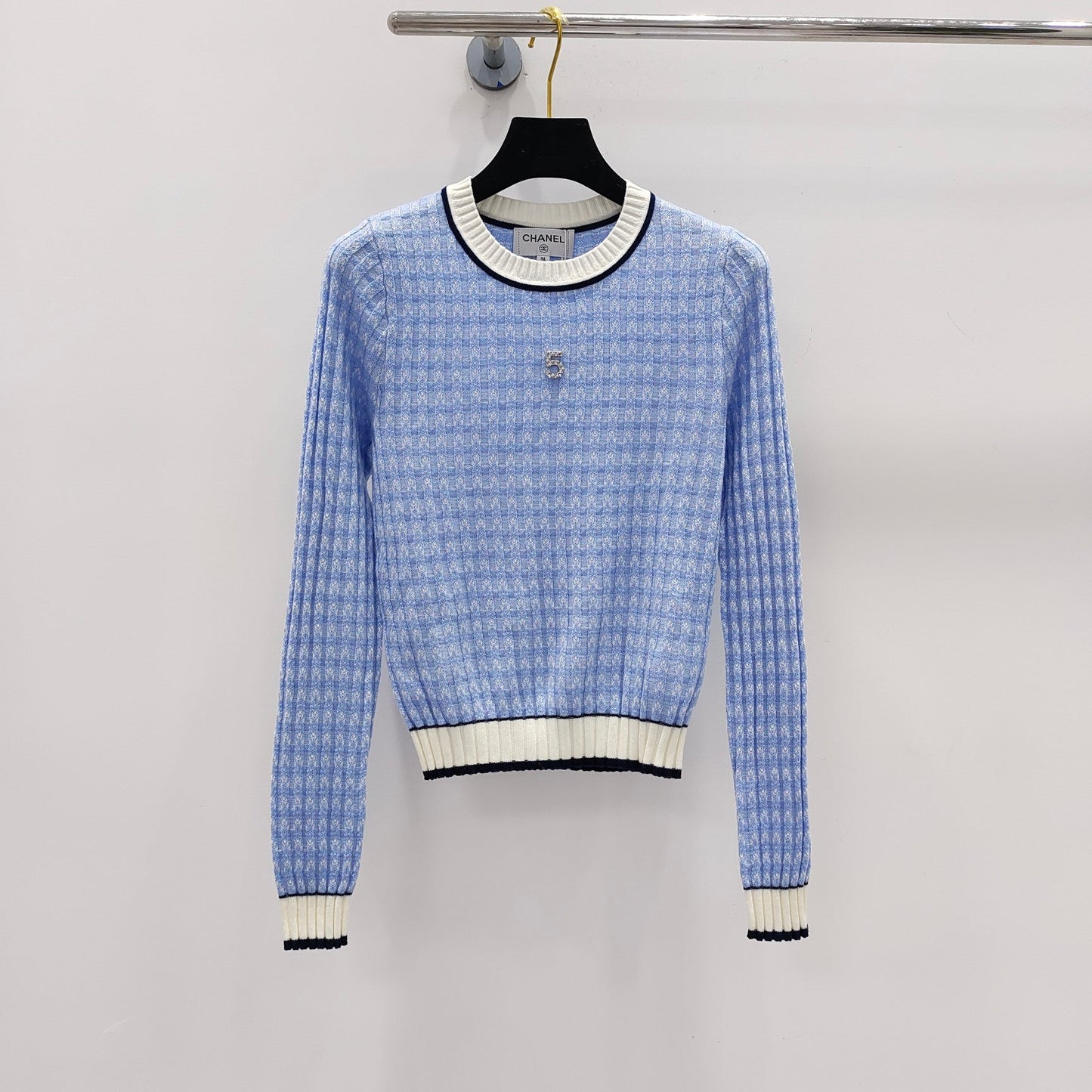 Pullover mit Schachbrettmuster