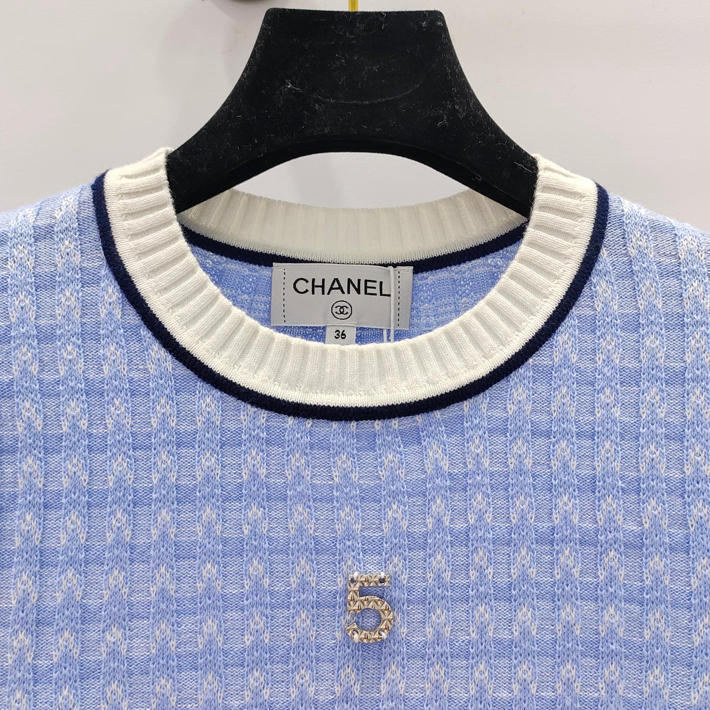 Pullover mit Schachbrettmuster