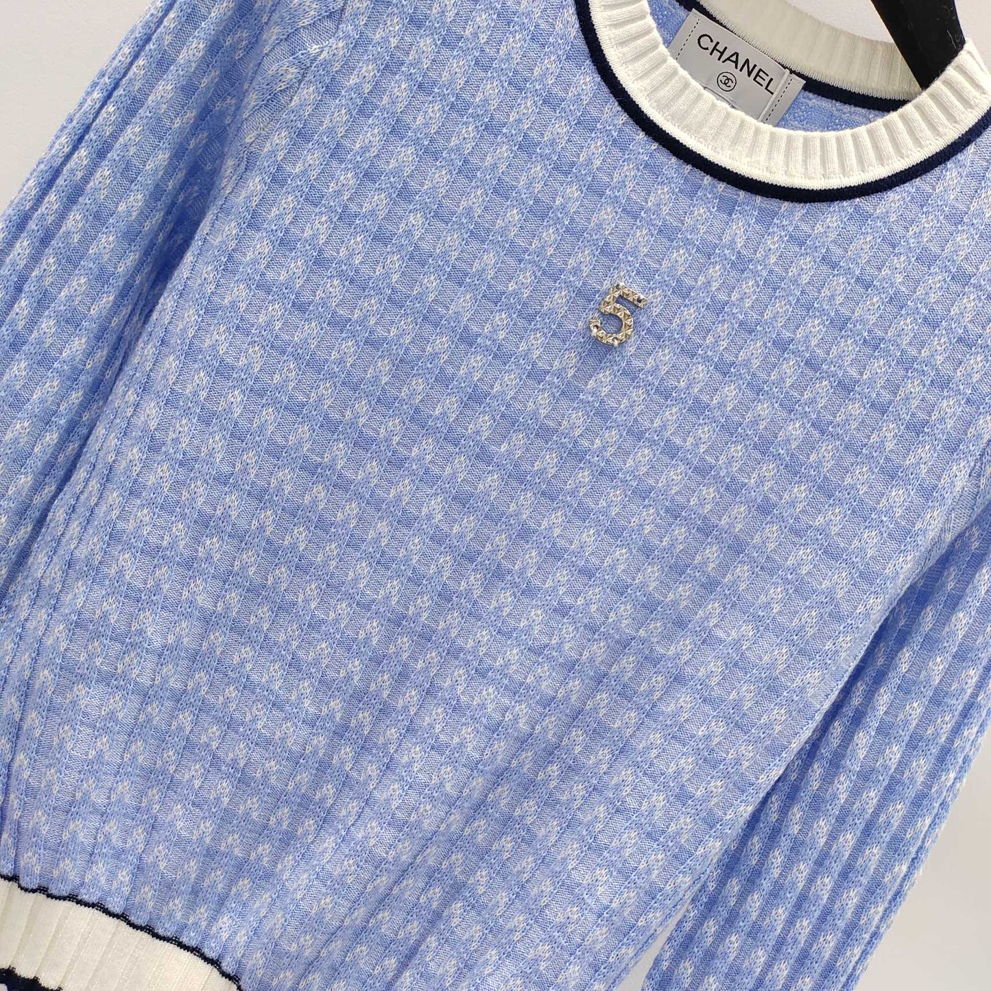 Pullover mit Schachbrettmuster