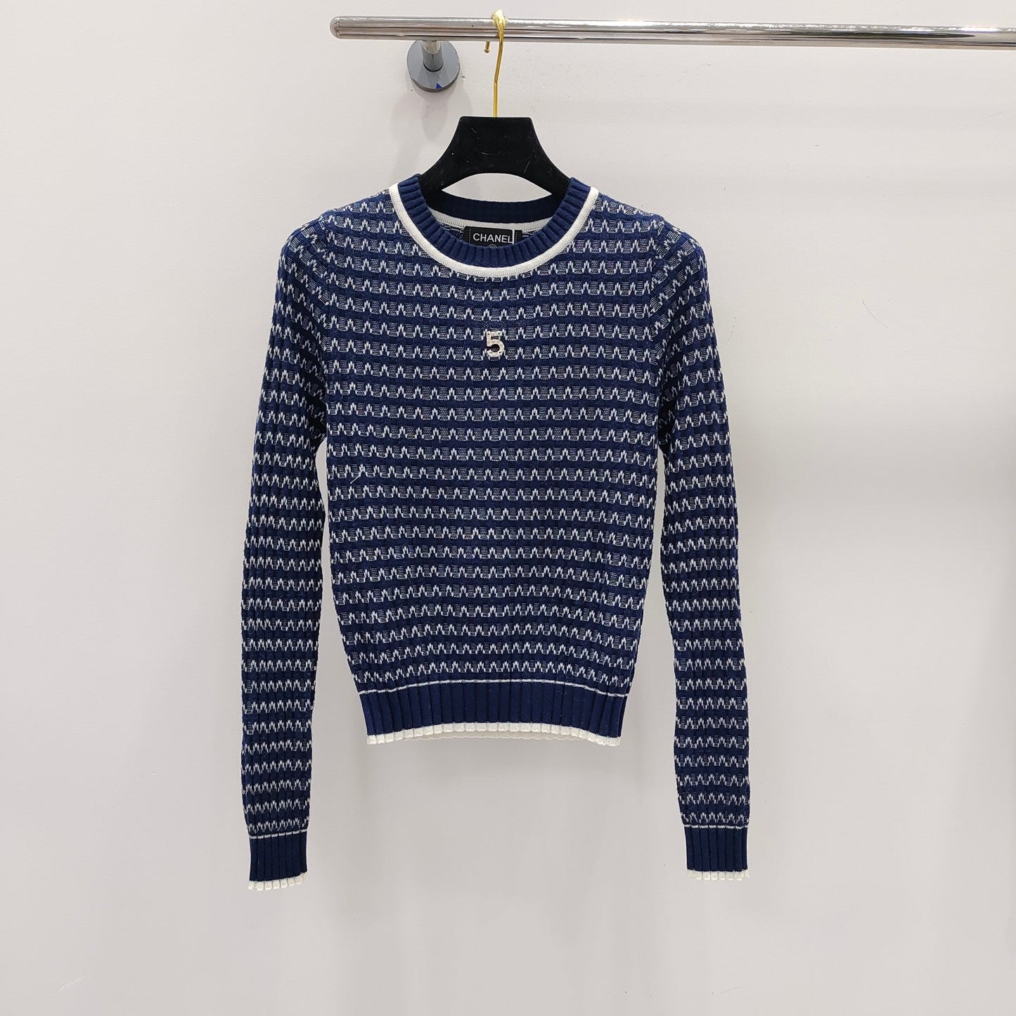 Pullover mit Schachbrettmuster