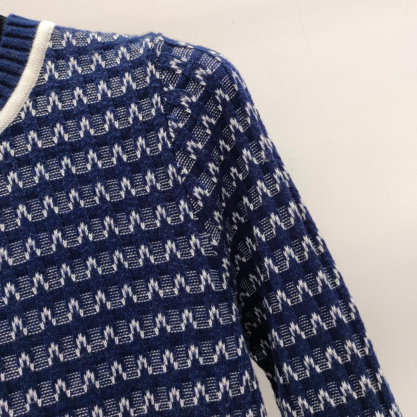 Pullover mit Schachbrettmuster