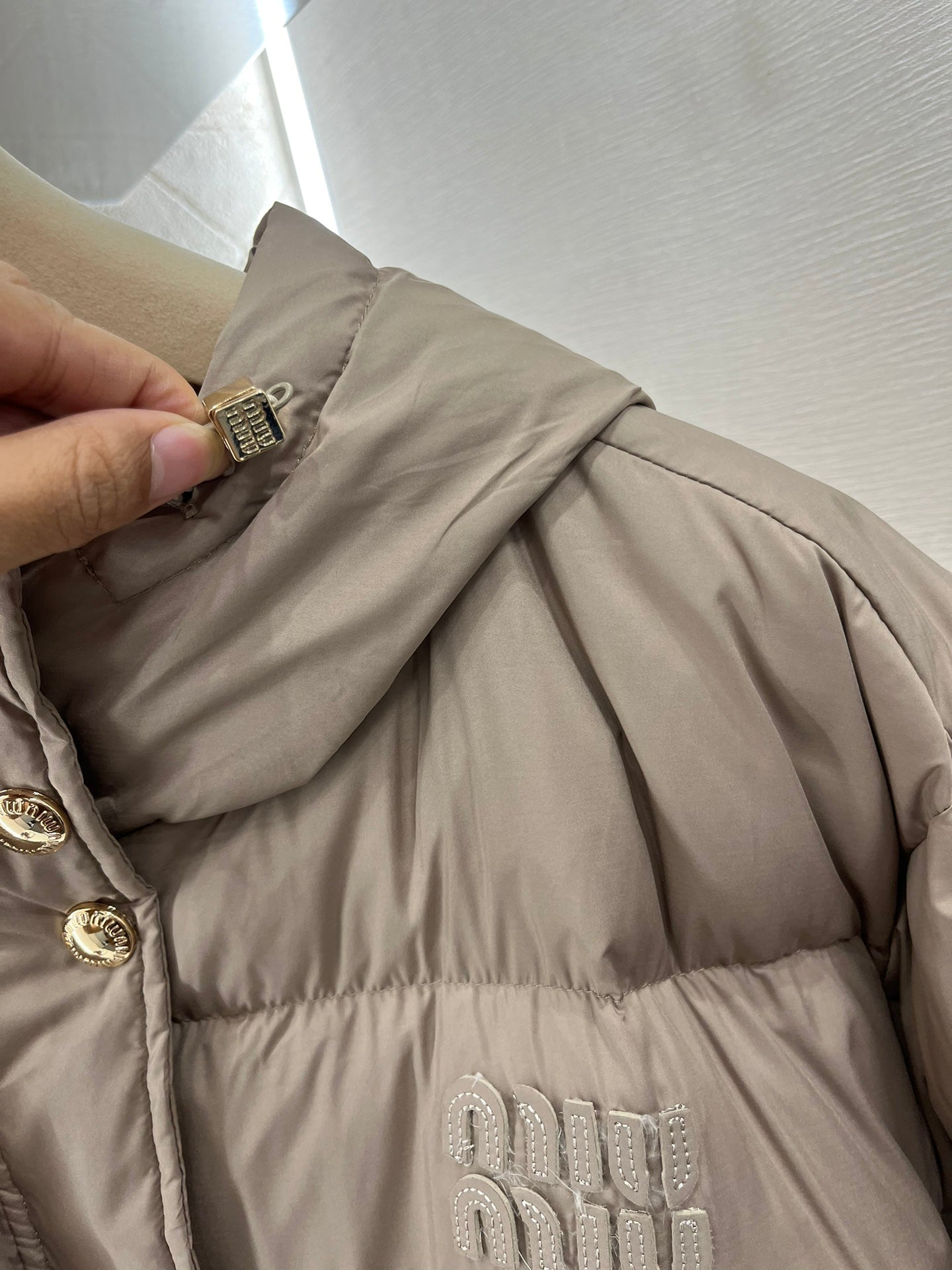 Doudoune à capuche et boutons-pression