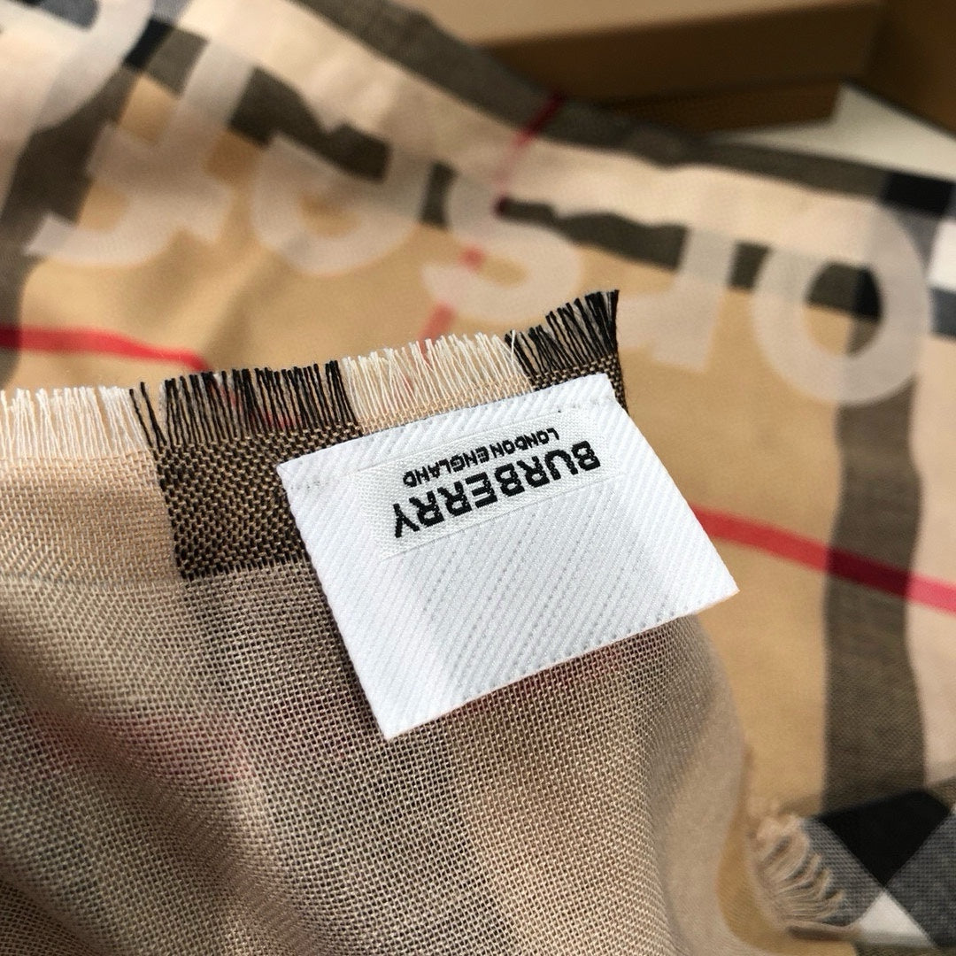 Écharpe à pompons double face