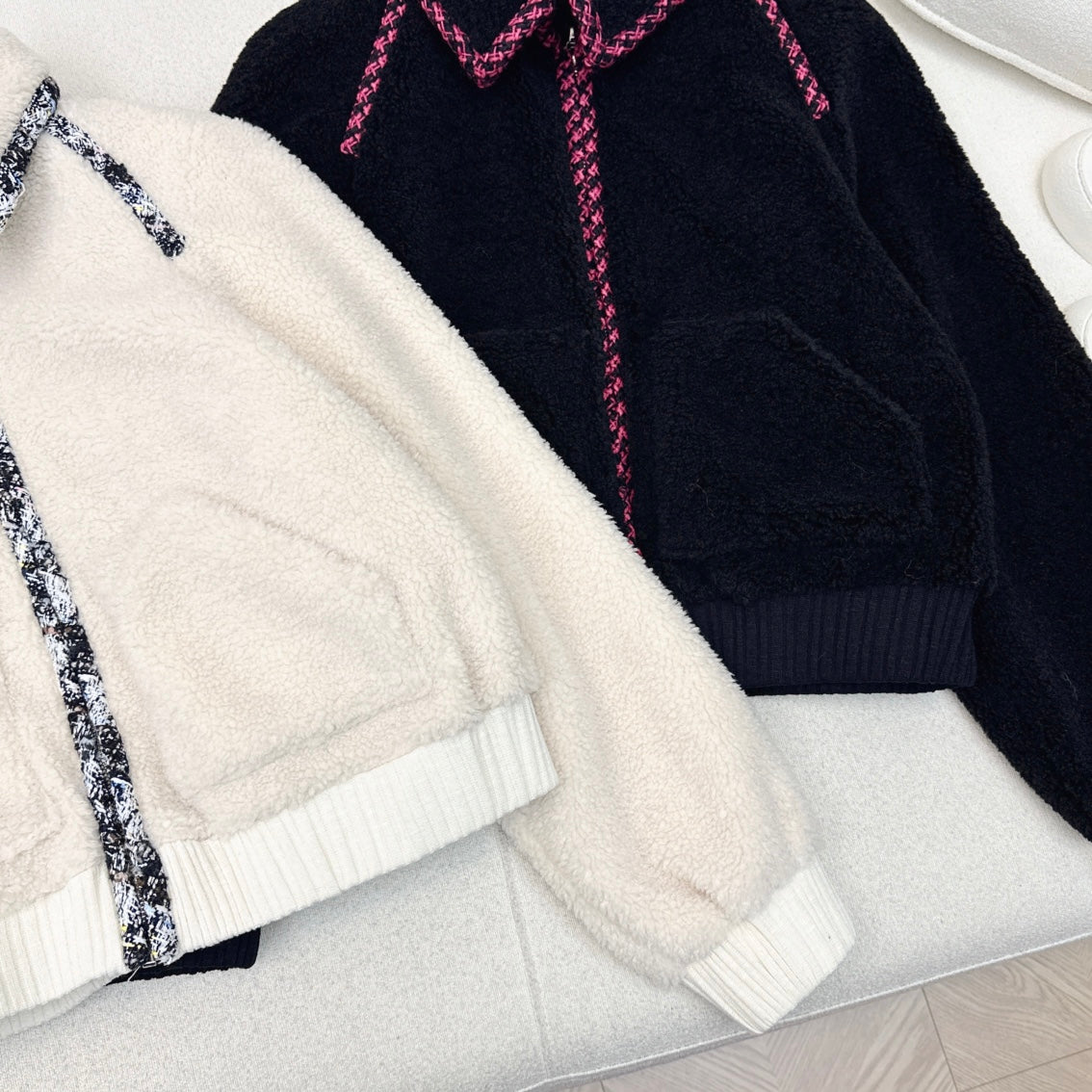 Umweltfreundlicher Teddy-Pelzmantel mit geflochtenem Saum