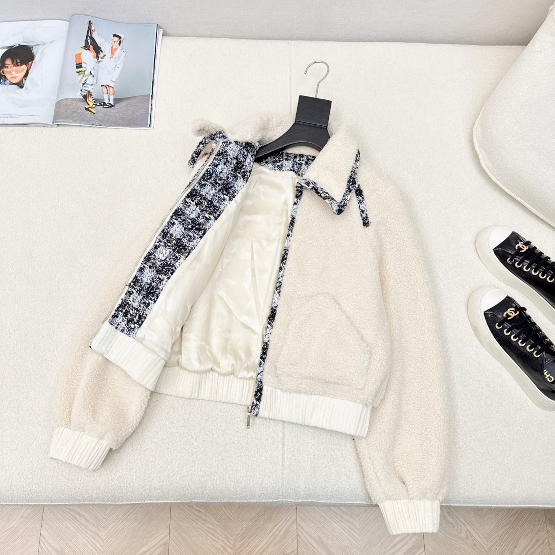 Umweltfreundlicher Teddy-Pelzmantel mit geflochtenem Saum