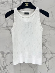 Hollow knitted vest with perforations