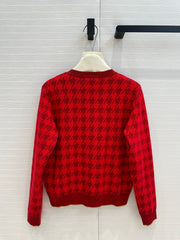Cardigan en tricot pied-de-poule avec bordure dorée
