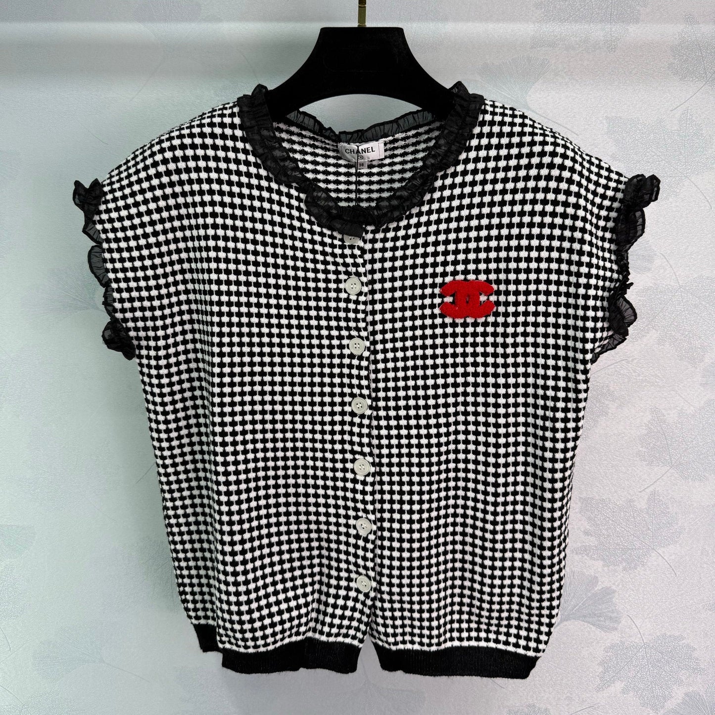 Kurzärmlige Strickjacke mit Hahnentrittmuster