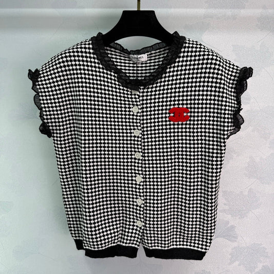 Kurzärmlige Strickjacke mit Hahnentrittmuster
