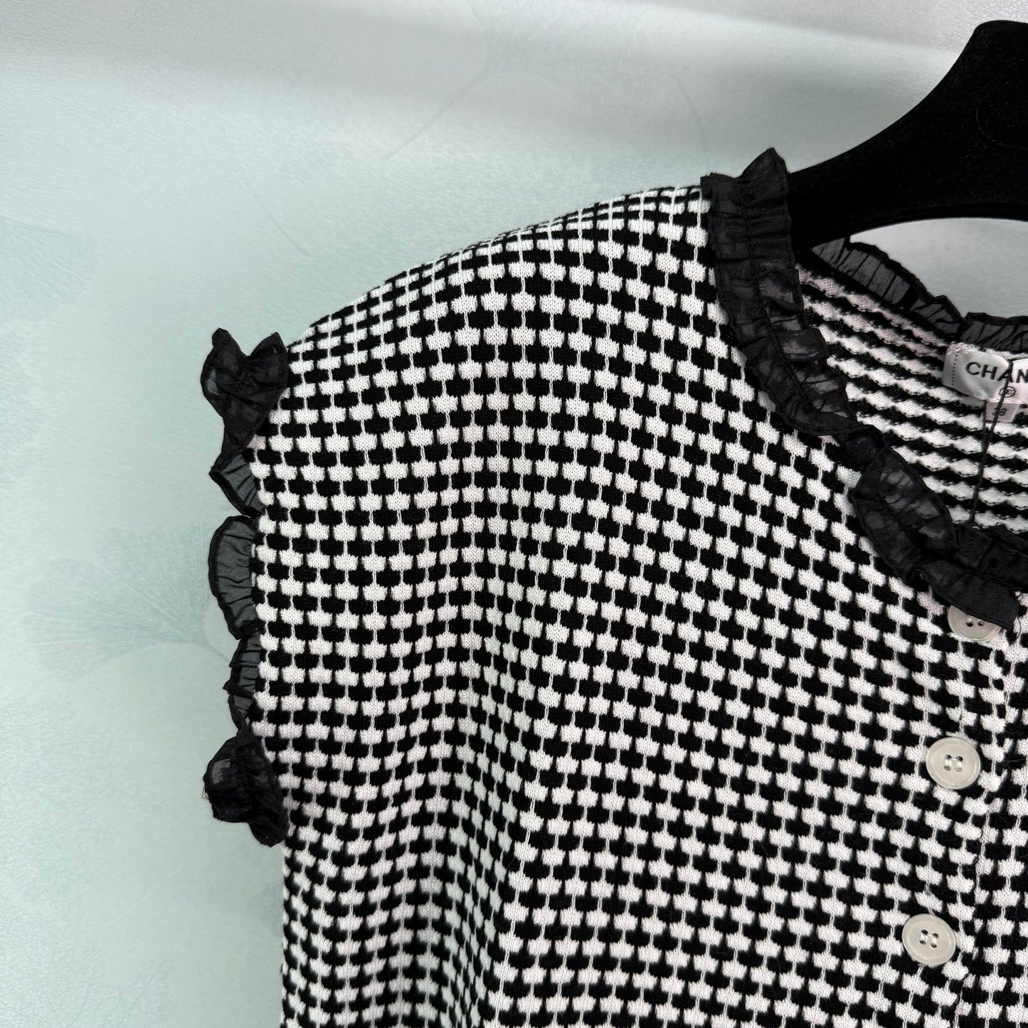 Kurzärmlige Strickjacke mit Hahnentrittmuster