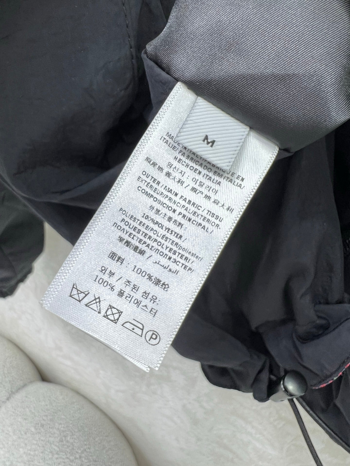 Veste réversible en laine jacquard à capuche et fermeture éclair