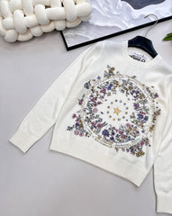 Wool sweater with gold floral and star embroidery