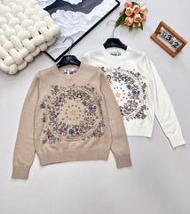Wool sweater with gold floral and star embroidery
