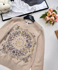 Wool sweater with gold floral and star embroidery