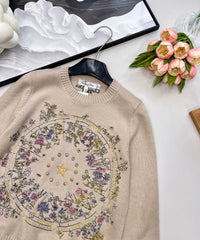 Wool sweater with gold floral and star embroidery