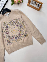 Wool sweater with gold floral and star embroidery
