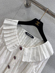 Single-breasted pleated long-sleeved shirt with a baby doll collar