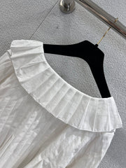 Single-breasted pleated long-sleeved shirt with a baby doll collar