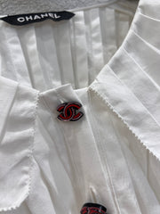 Single-breasted pleated long-sleeved shirt with a baby doll collar