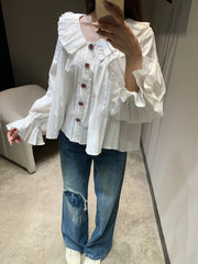 Single-breasted pleated long-sleeved shirt with a baby doll collar