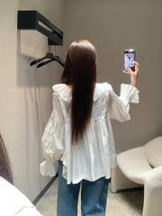 Single-breasted pleated long-sleeved shirt with a baby doll collar