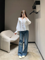 Single-breasted pleated long-sleeved shirt with a baby doll collar