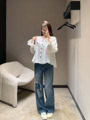 Single-breasted pleated long-sleeved shirt with a baby doll collar