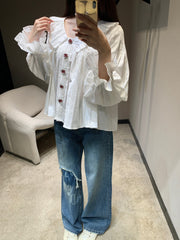 Single-breasted pleated long-sleeved shirt with a baby doll collar